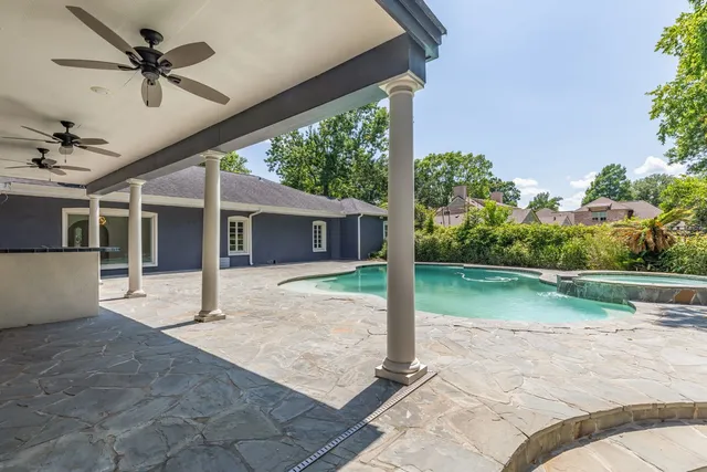 a house with garden in front of it