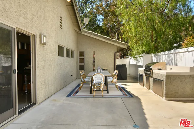 a view of kitchen and dining room with wooden floor