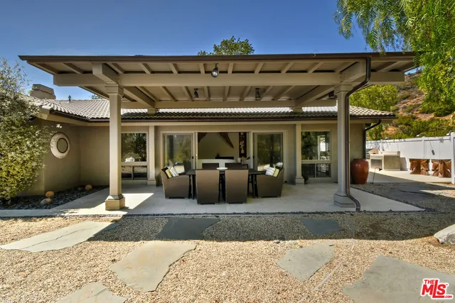 a bedroom with a bed and walk in closet