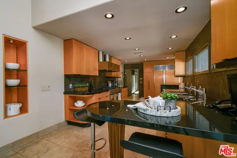 a bathroom with a tub and a sink