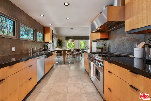 a front view of a house with furniture