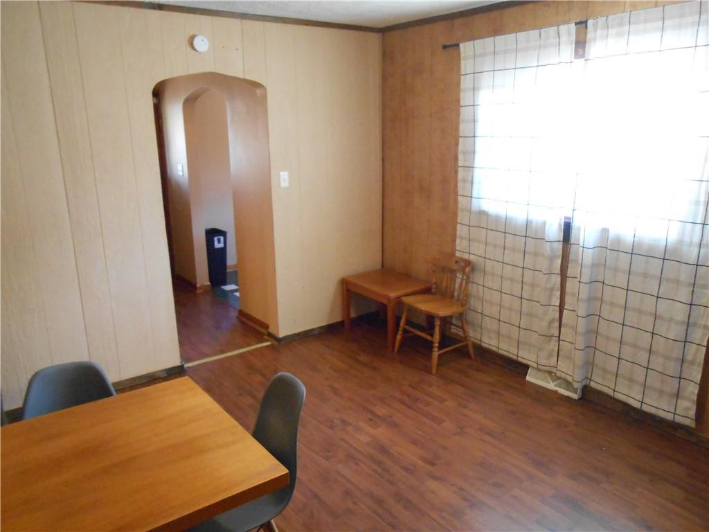 516 Oneida Street Monessen, PA 15062 - Photo 11 of 36 a view of a livingroom with furniture and a gate