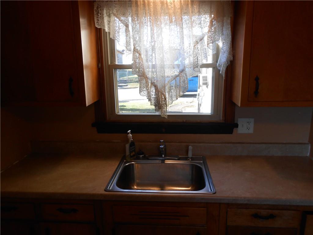516 Oneida Street Monessen, PA 15062 - Photo 15 of 36 a kitchen that has a sink and a window