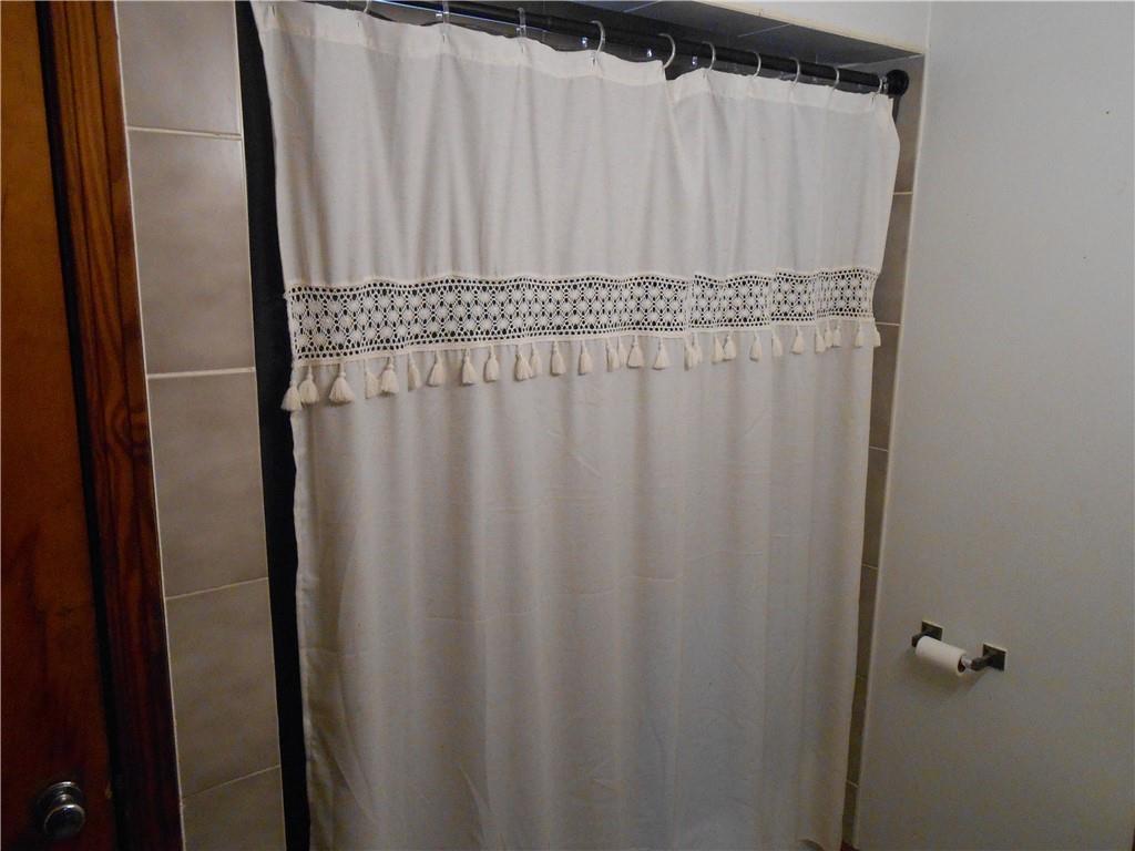 516 Oneida Street Monessen, PA 15062 - Photo 19 of 36 a view of a bathroom with a shower