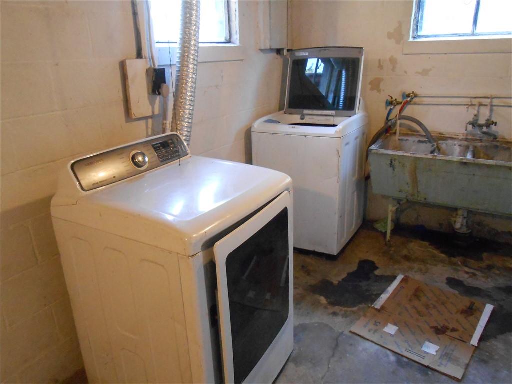 516 Oneida Street Monessen, PA 15062 - Photo 32 of 36 a utility room with dryer and washer