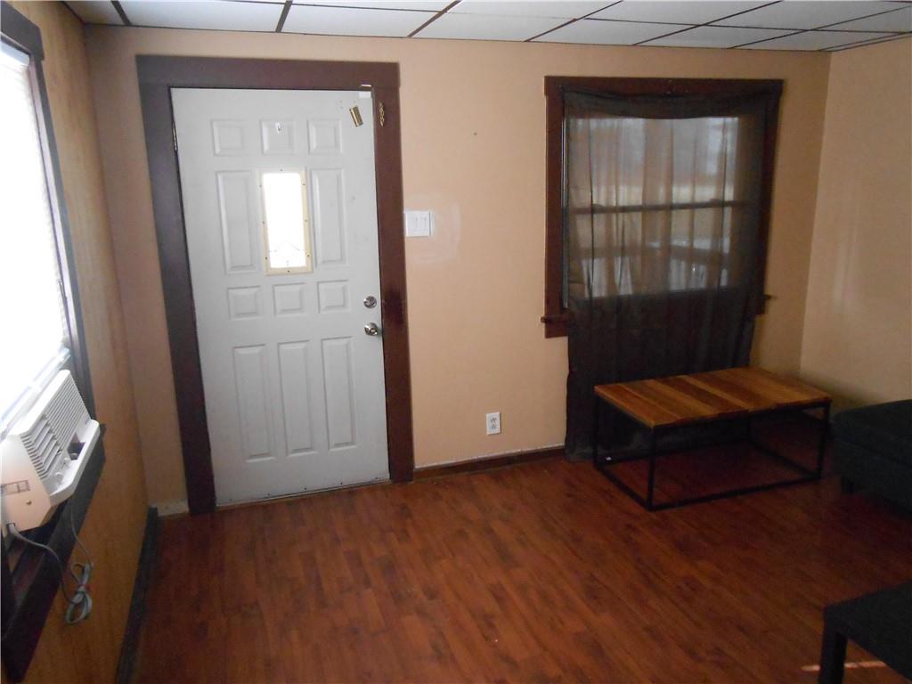 516 Oneida Street Monessen, PA 15062 - Photo 5 of 36 an empty room with windows and closet