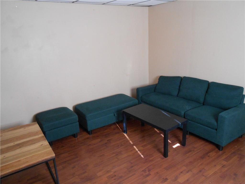 516 Oneida Street Monessen, PA 15062 - Photo 6 of 36 a living room with furniture and a wooden floor