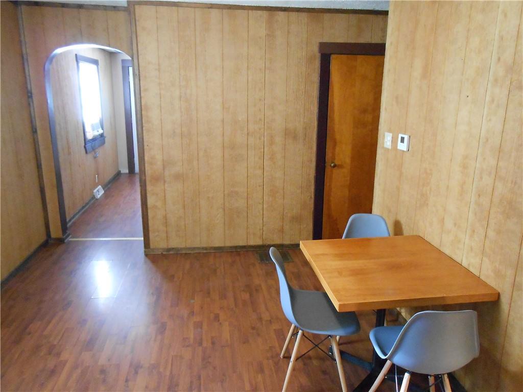 516 Oneida Street Monessen, PA 15062 - Photo 9 of 36 a view of a room with furniture and wooden floor