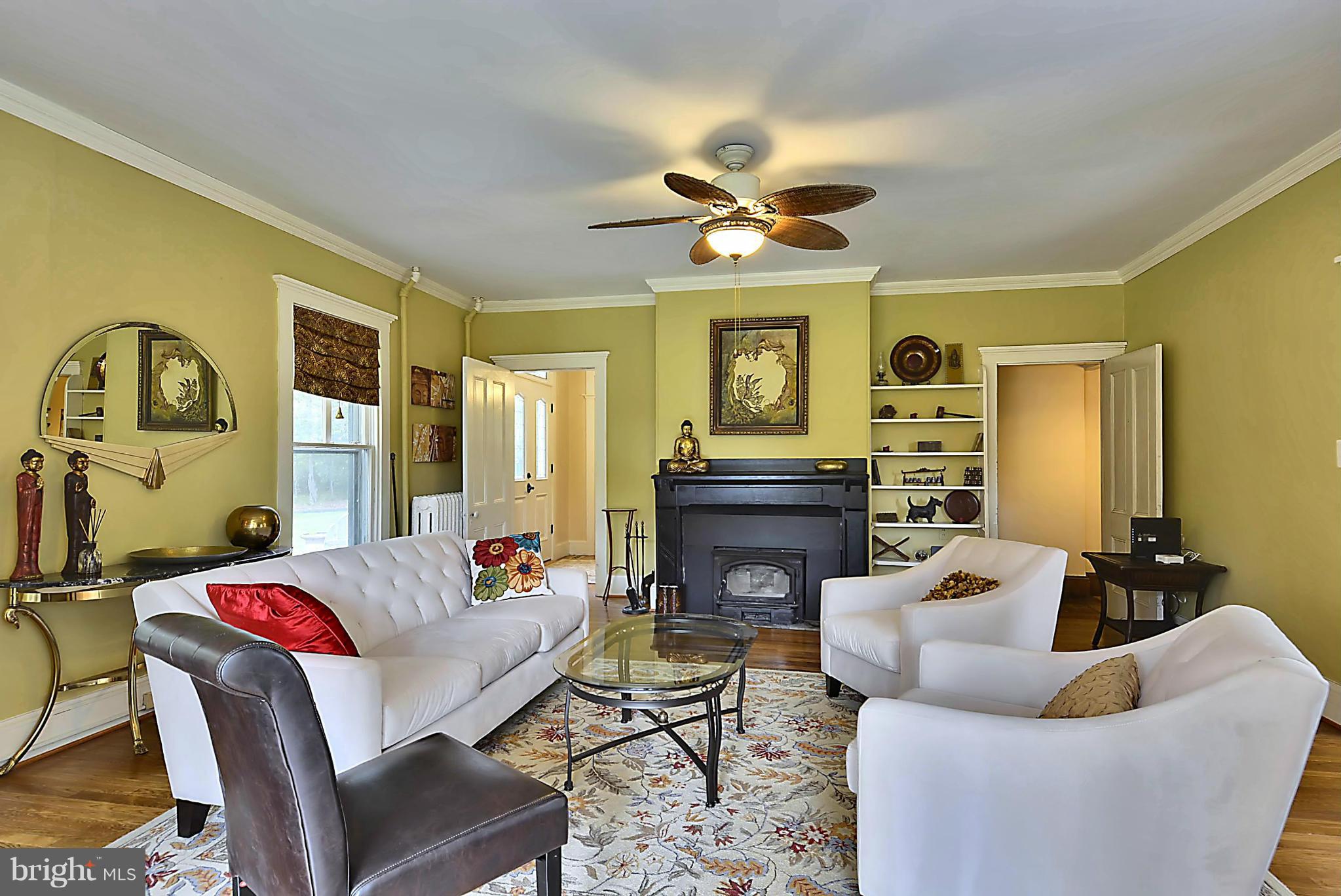 315 Ashton Road Ashton, MD 20861 - Photo 8 of 30 Fireplace insert warms the cozy family room