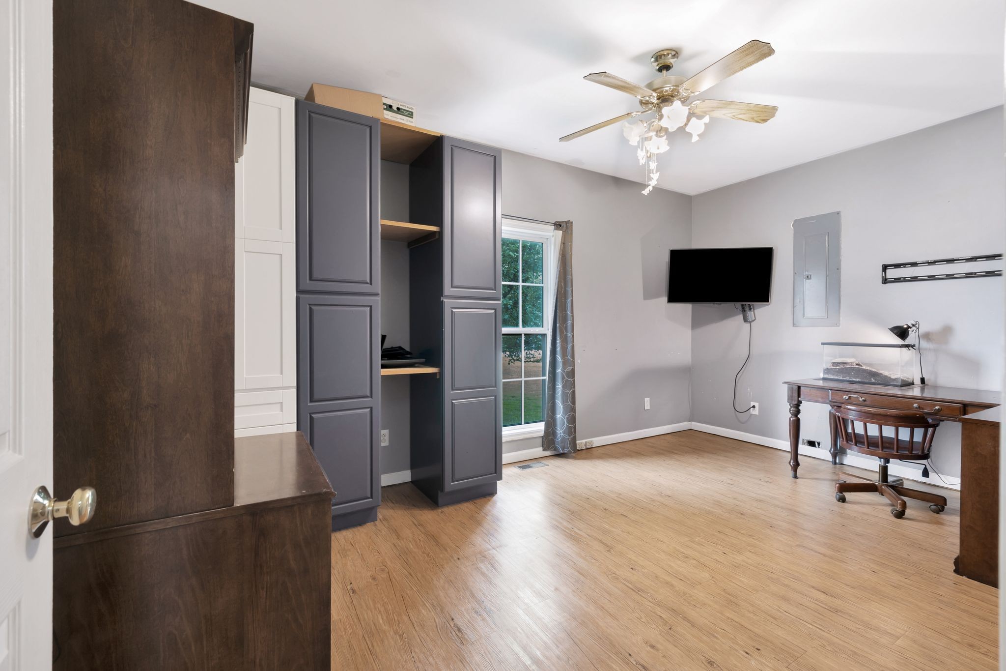 876 Monument Road Summertown, TN 38483 - Photo 16 of 26 a view of a livingroom with a flat screen tv