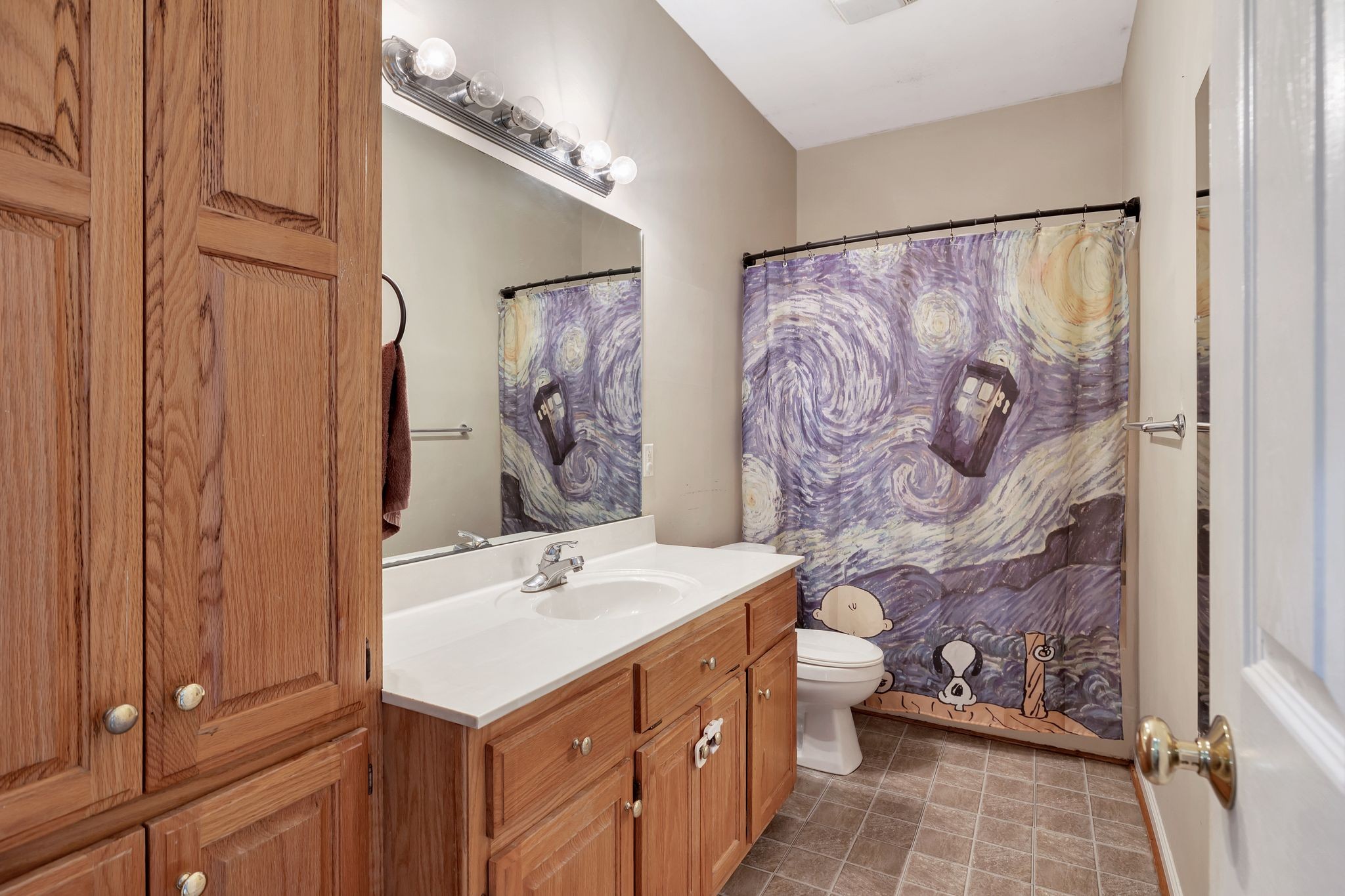 876 Monument Road Summertown, TN 38483 - Photo 18 of 26 a bathroom with a sink and a mirror