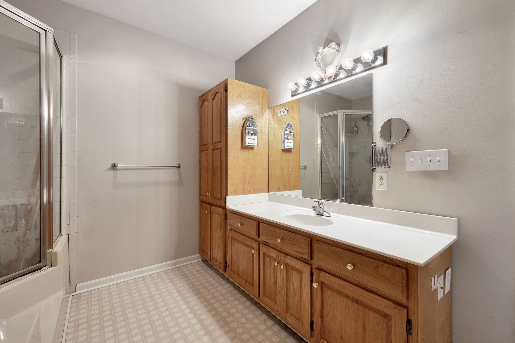 876 Monument Road Summertown, TN 38483 - Photo 22 of 26 a bathroom with a sink and a mirror