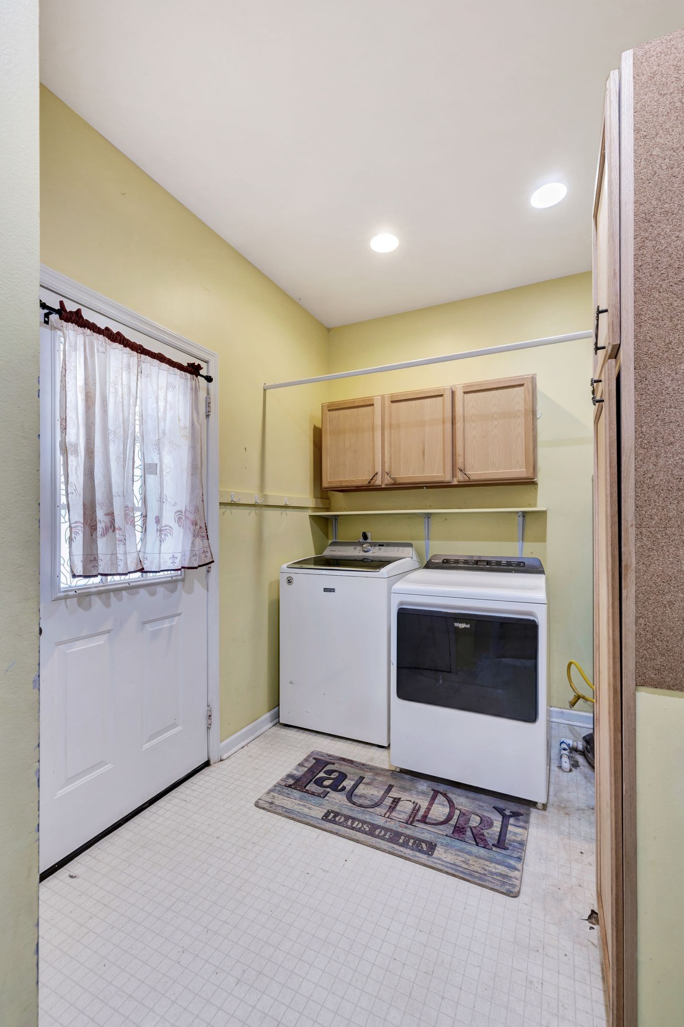 876 Monument Road Summertown, TN 38483 - Photo 23 of 26 a kitchen with stainless steel appliances granite countertop a refrigerator and a stove top oven