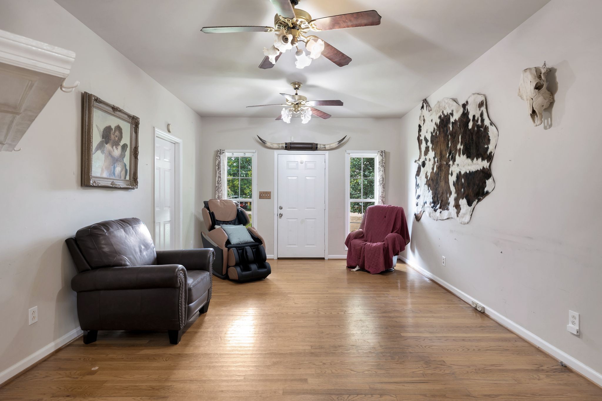 876 Monument Road Summertown, TN 38483 - Photo 9 of 26 a living room with furniture and wooden floor