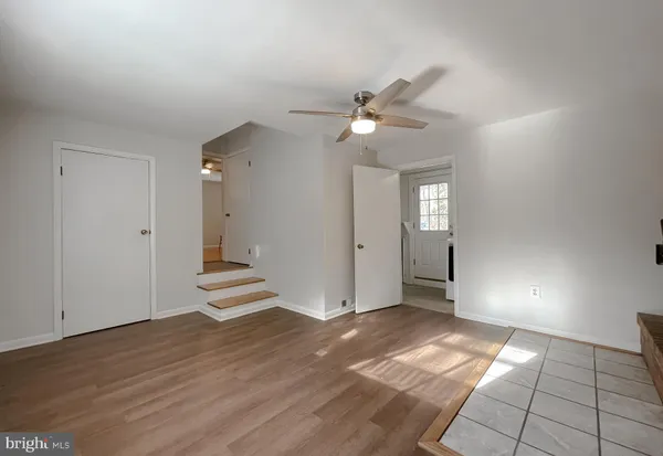a view of entryway with wooden floor