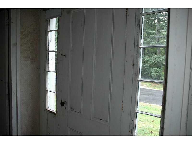 16 Raymond Cape Road Casco, ME 04015 - Photo 23 of 28 Entry. Sidelights go all the way down