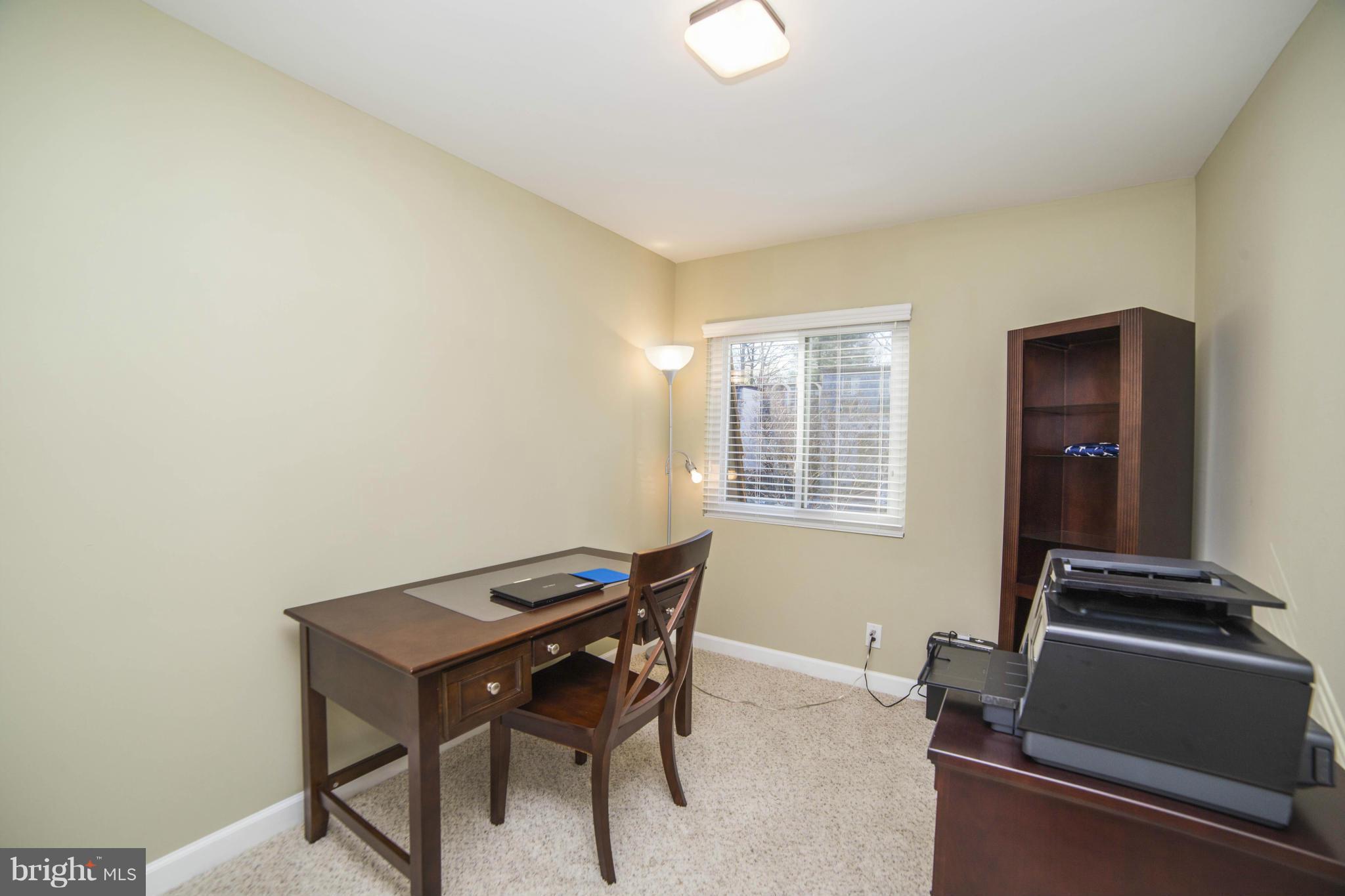 1613 Valencia Way Reston, VA 20190 - Photo 16 of 29 a view of a room with furniture and a window