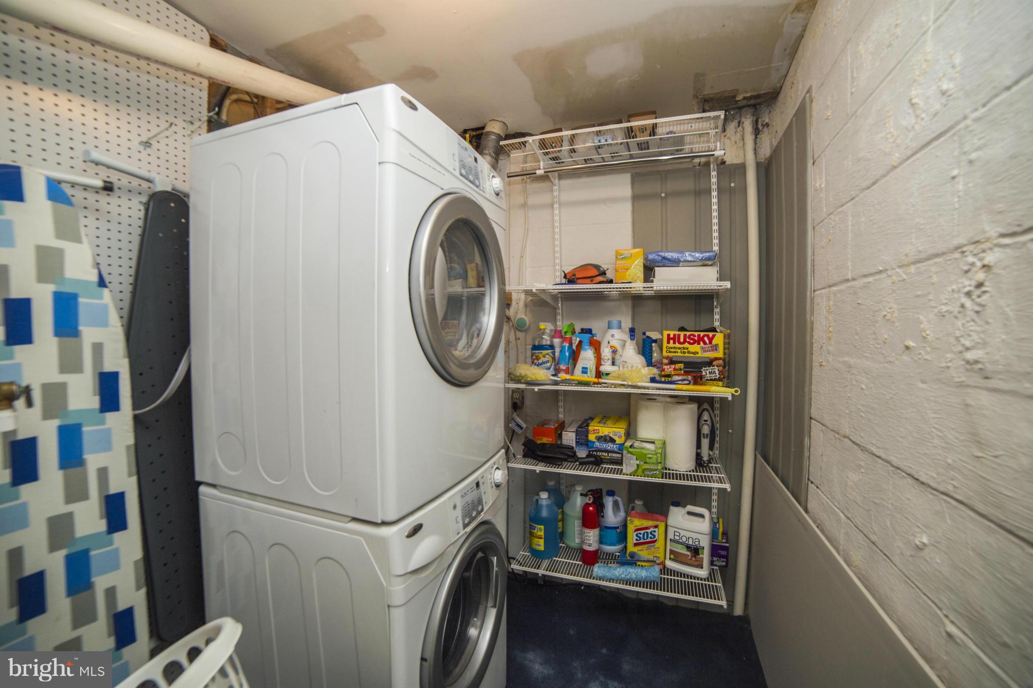 1613 Valencia Way Reston, VA 20190 - Photo 27 of 29 a utility room with dryer and washer