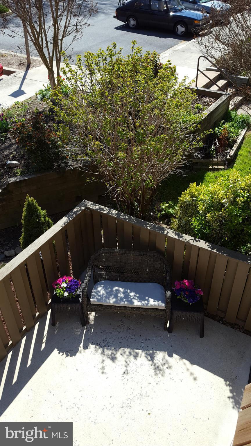 1613 Valencia Way Reston, VA 20190 - Photo 29 of 29 a view of a bench in the roof deck