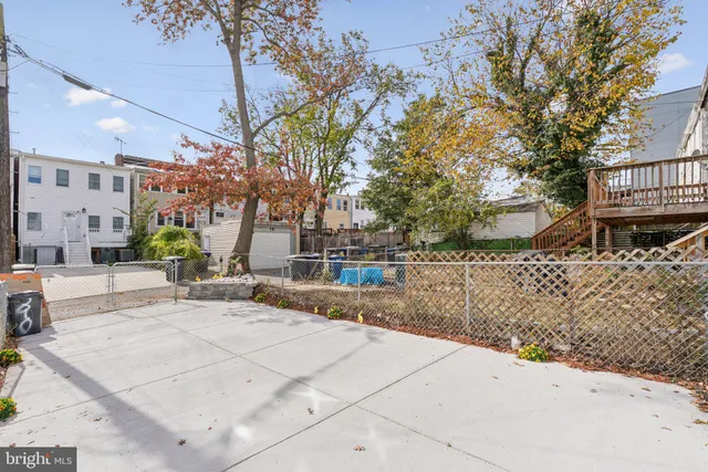 a view of a building with many trees