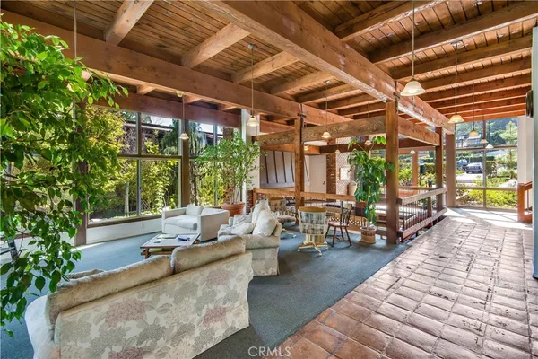 a view of a swimming pool with a patio