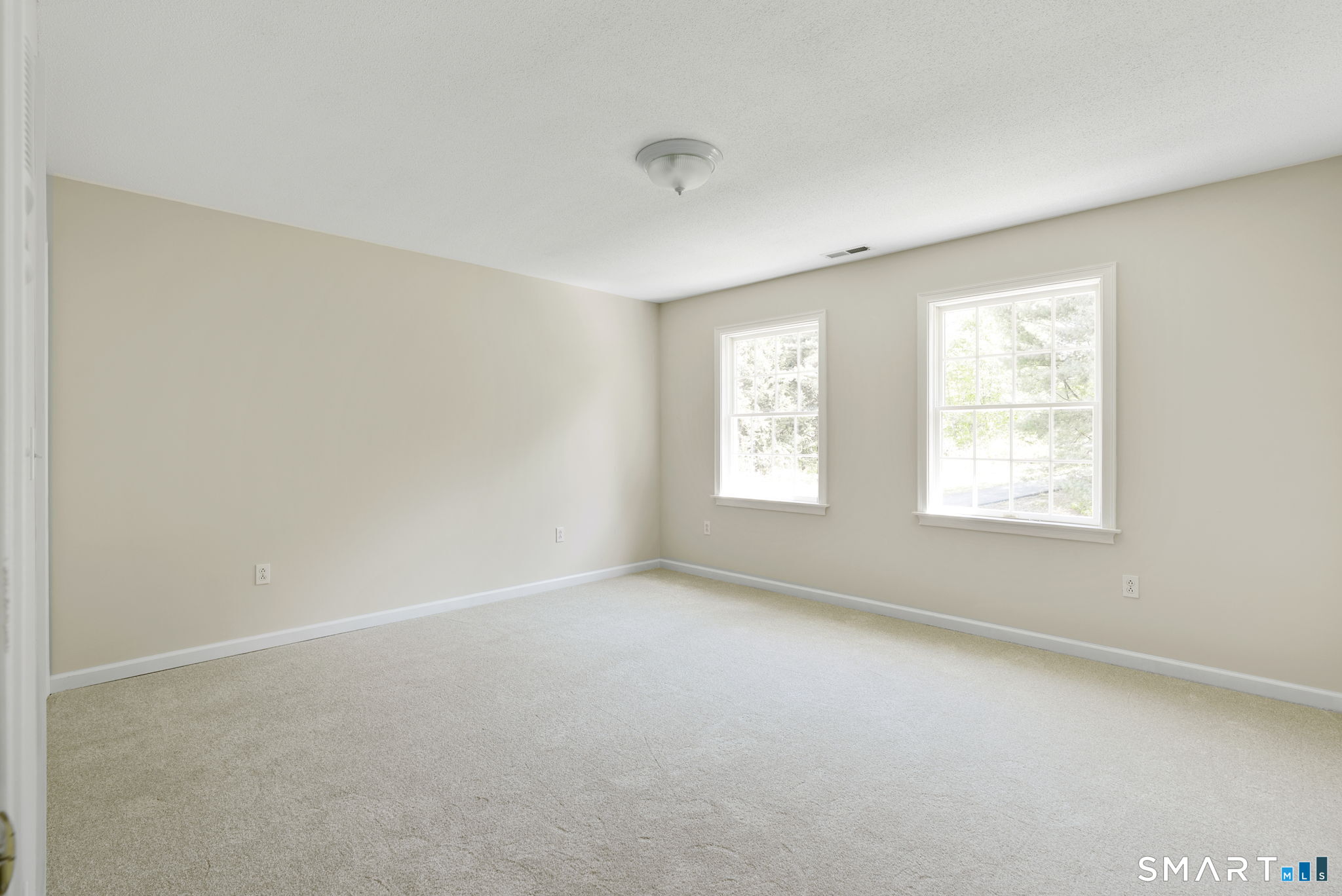 555 Waterville Road Avon, CT 06001 - Photo 36 of 40 an empty room with windows
