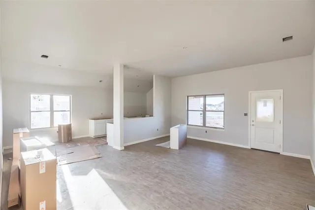 a view of an empty room and window