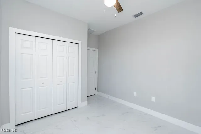 a view of a small space with wooden floor