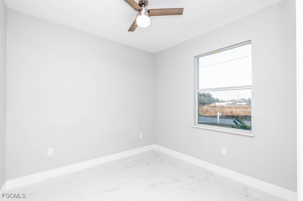 4417 22nd Street Southwest Lehigh Acres, FL 33973 - Photo 12 of 36 a view of a window in a room