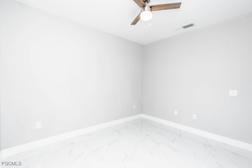 4417 22nd Street Southwest Lehigh Acres, FL 33973 - Photo 9 of 36 a view of a small space