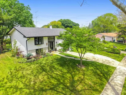 a house that has a lot of plants in it