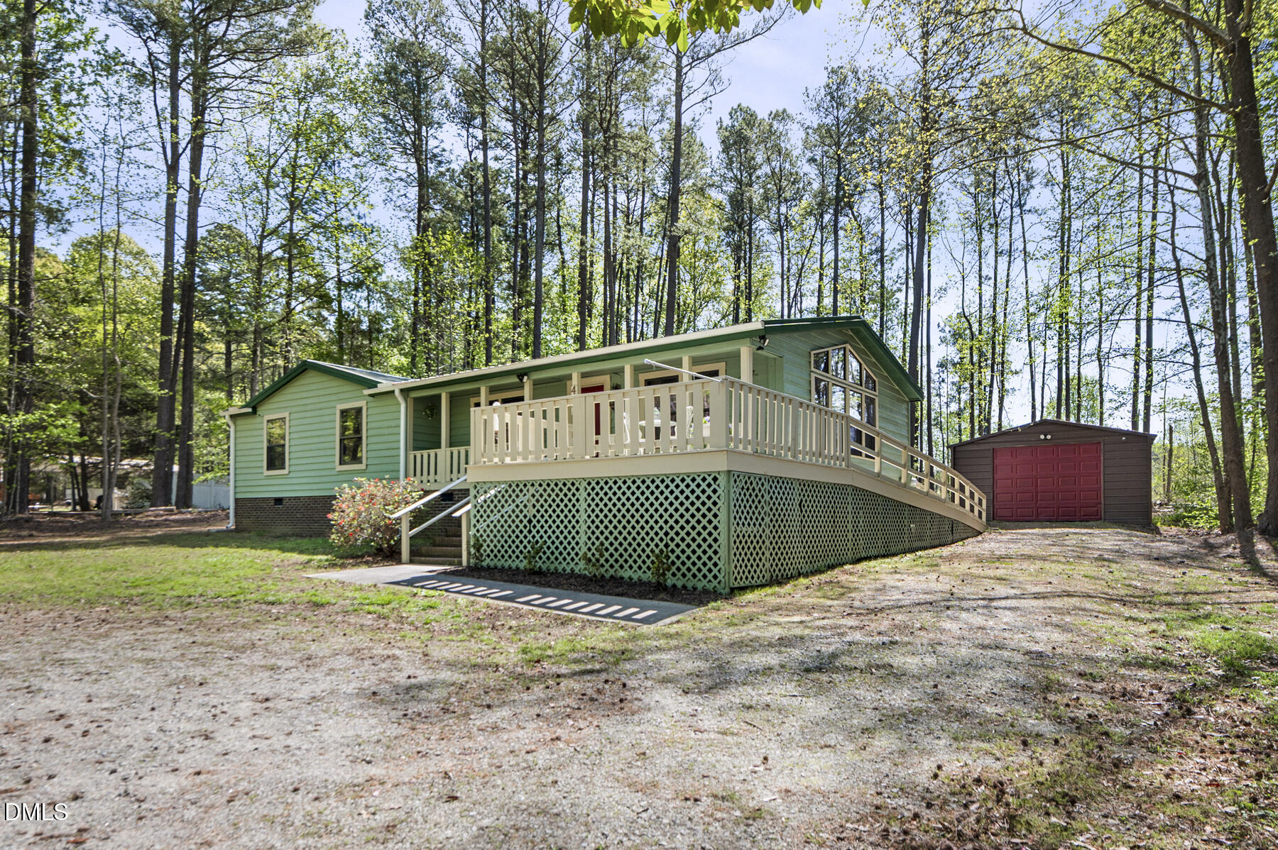 492 Little Mill Road Henderson, NC 27537 - Photo 3 of 39 a view of a house with backyard and sitting area