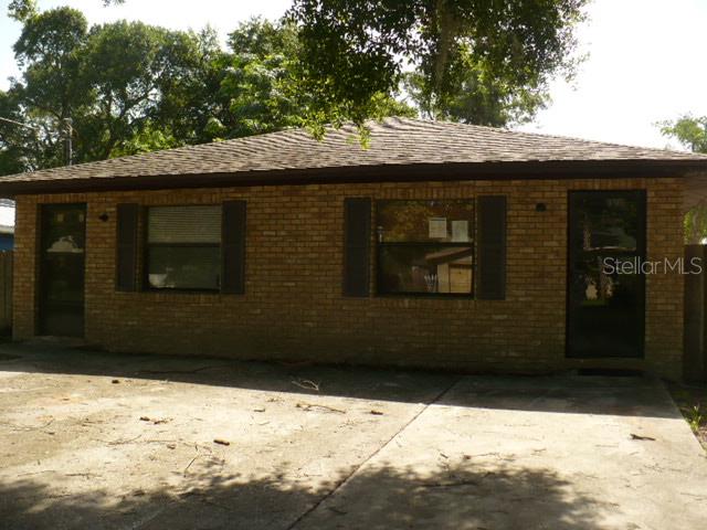812 North Rockingham Avenue Tavares, FL 32778 - Photo 1 of 1 front with parking pad