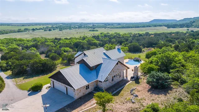 an aerial view of a house with garden