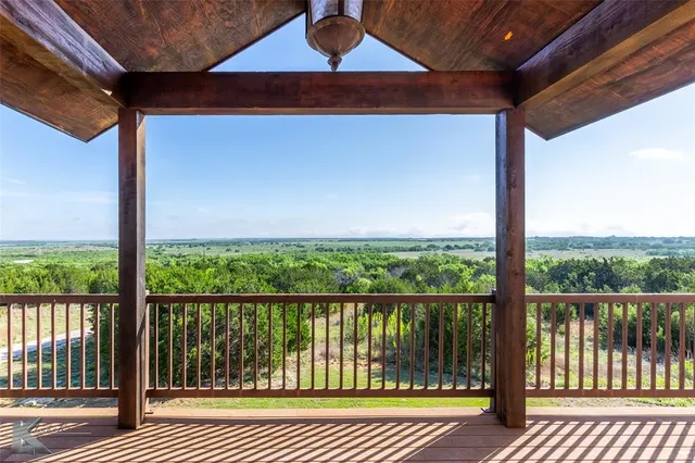 a view of a balcony with an outdoor space