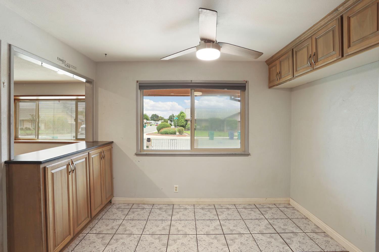 2443 Fern Street Merced, CA 95348 - Photo 14 of 50 an empty room with windows