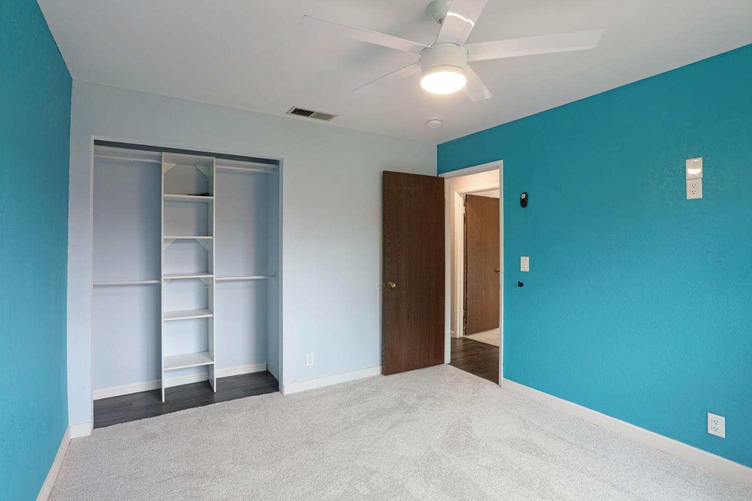 2443 Fern Street Merced, CA 95348 - Photo 21 of 50 a view of an empty room with a window