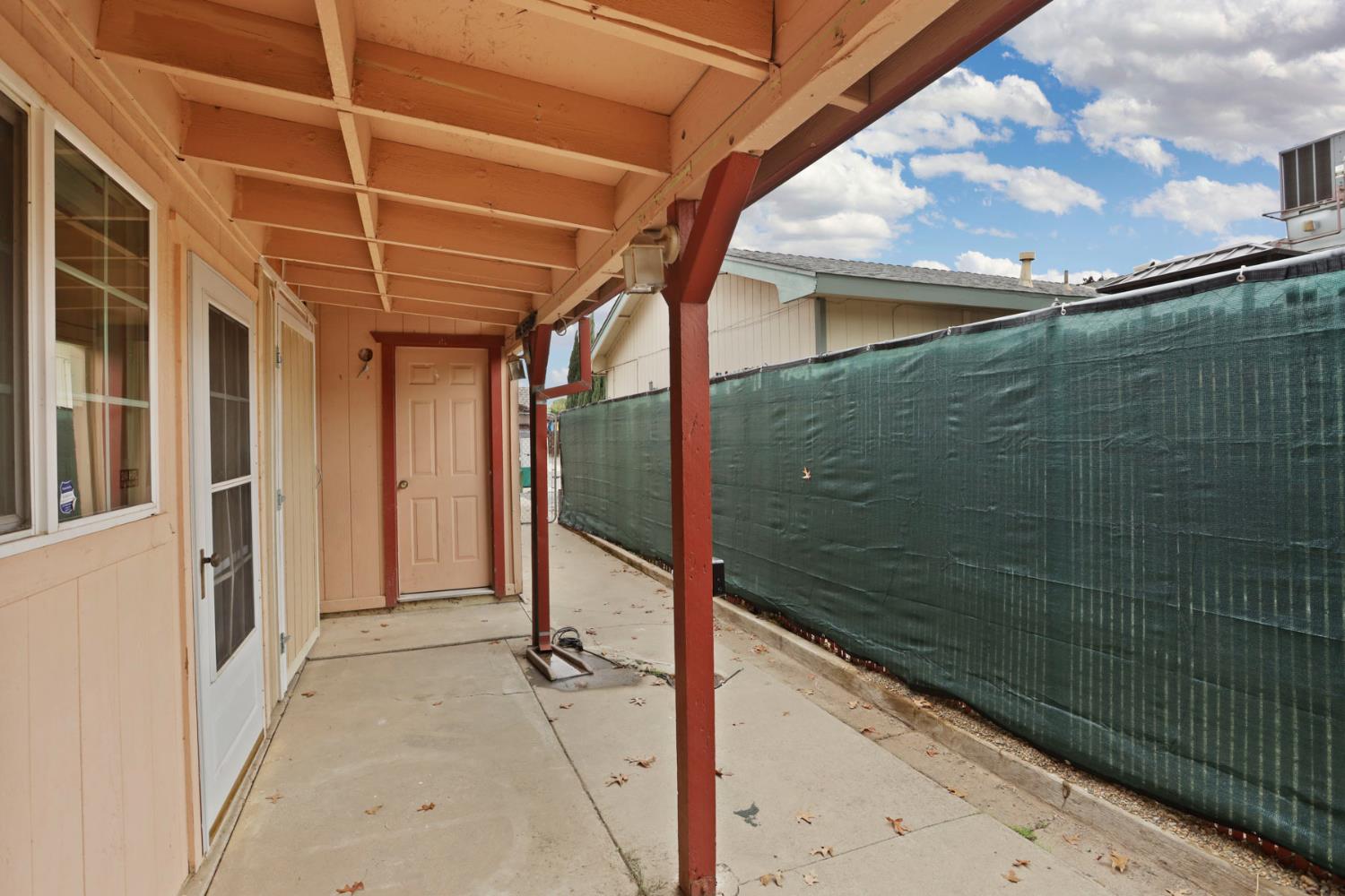 2443 Fern Street Merced, CA 95348 - Photo 29 of 50 a bathroom with a shower and a sink