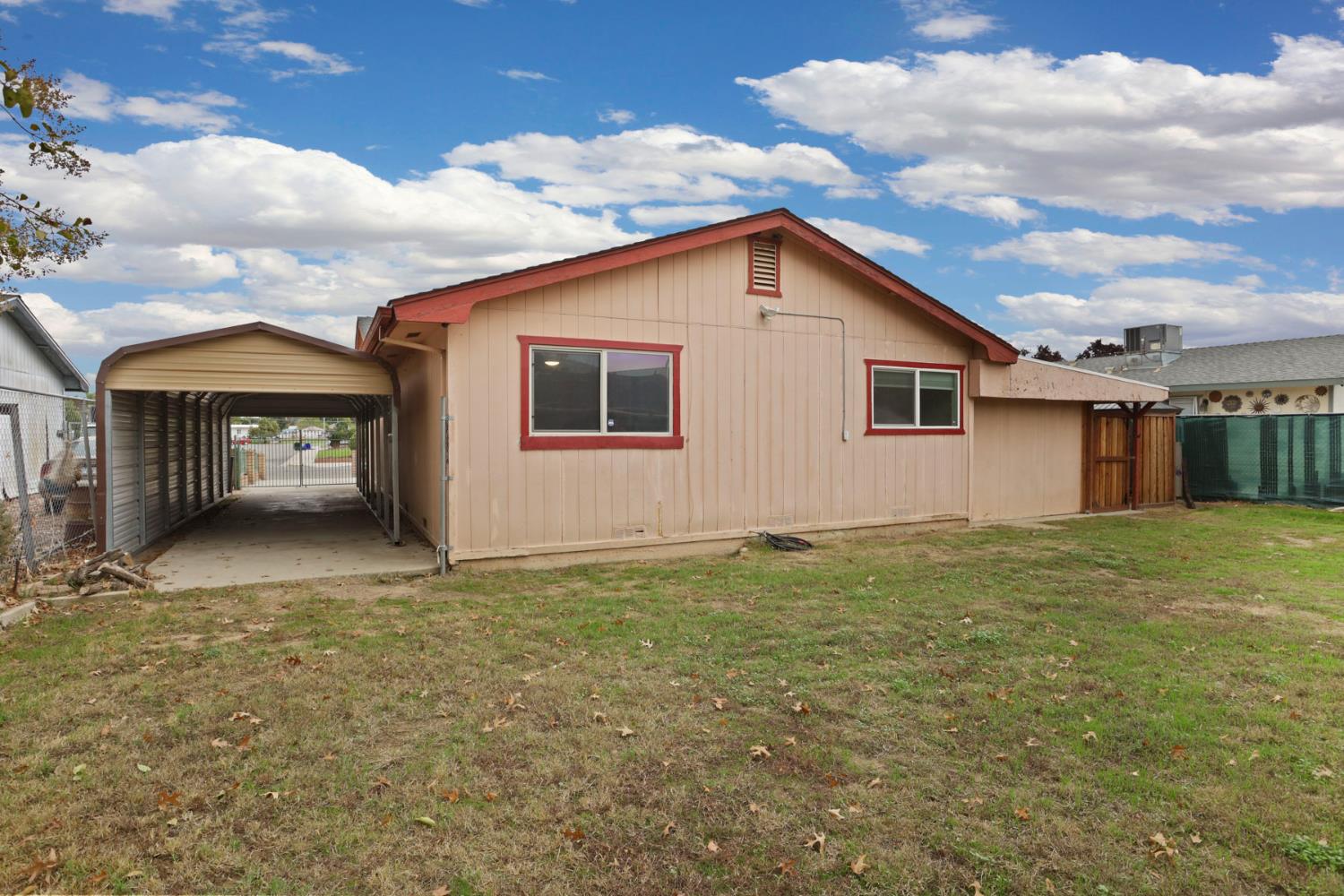 2443 Fern Street Merced, CA 95348 - Photo 33 of 50 a house with yard in front of it