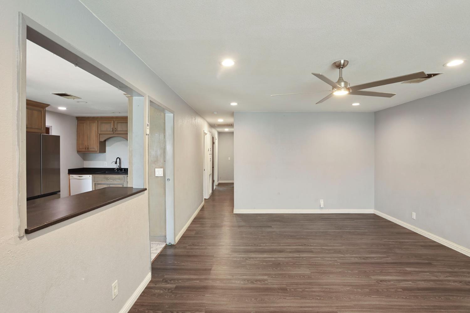 2443 Fern Street Merced, CA 95348 - Photo 6 of 50 a view of a kitchen with a sink and dishwasher