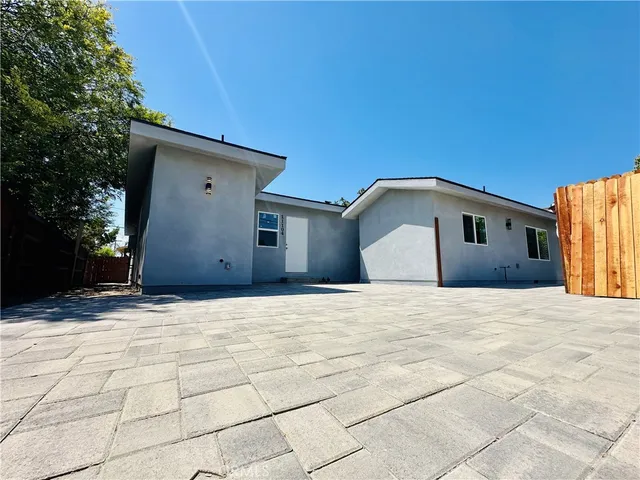 a house with yard in front of it