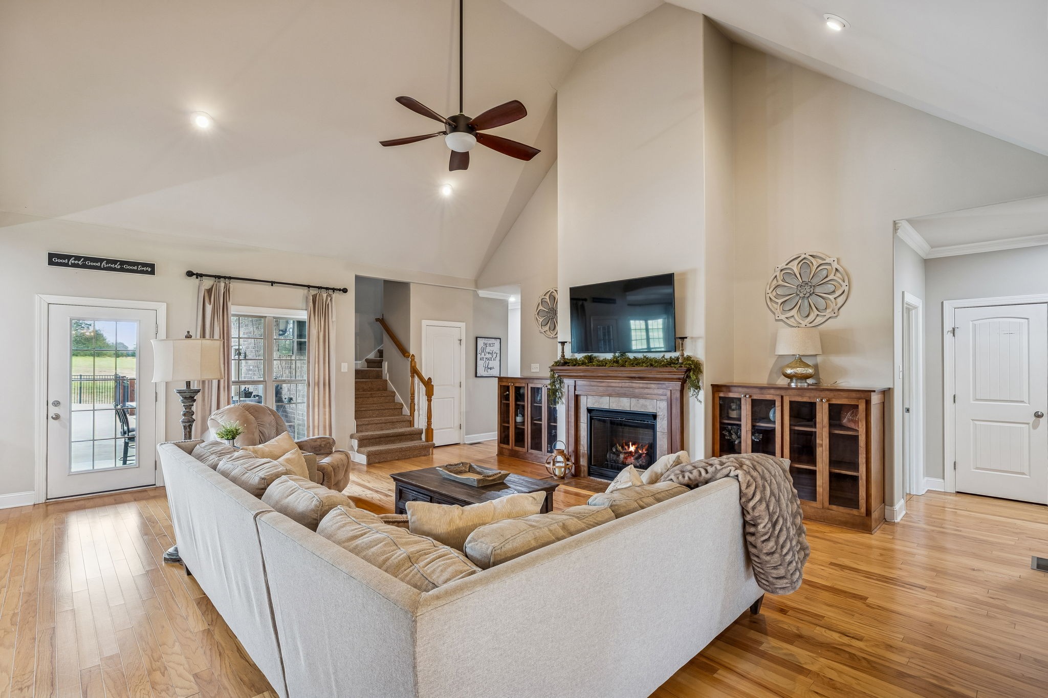 2845 Anes Station Road Lewisburg, TN 37091 - Photo 12 of 70 a living room with furniture a fireplace and a flat screen tv