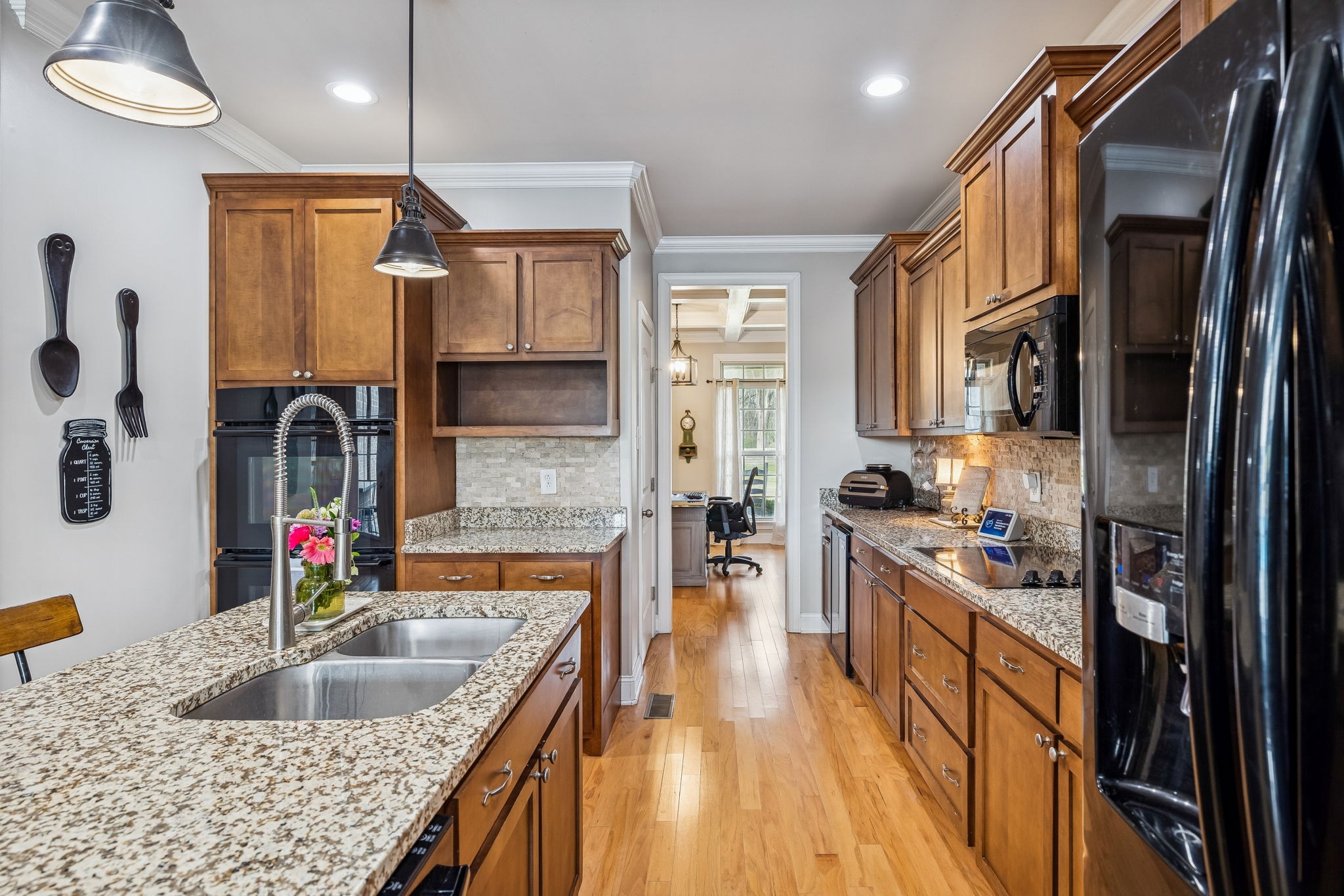 2845 Anes Station Road Lewisburg, TN 37091 - Photo 20 of 70 a kitchen with stainless steel appliances granite countertop a sink stove and refrigerator