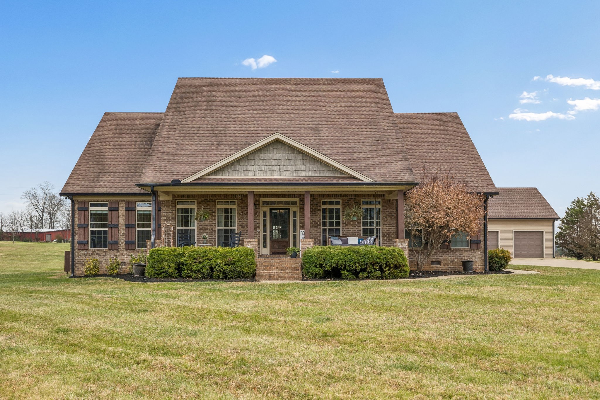 2845 Anes Station Road Lewisburg, TN 37091 - Photo 2 of 70 a front view of a house with a garden