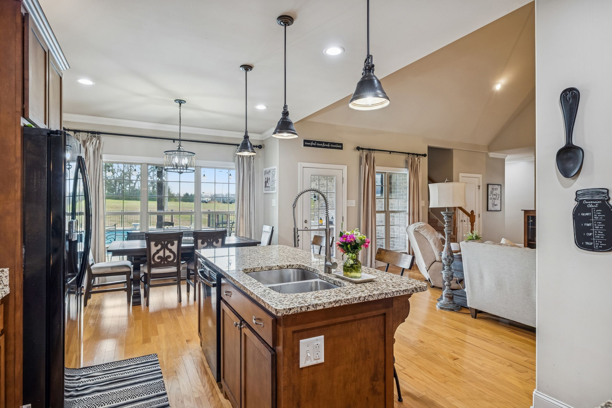 2845 Anes Station Road Lewisburg, TN 37091 - Photo 24 of 70 a kitchen with a table chairs stove and kitchen view
