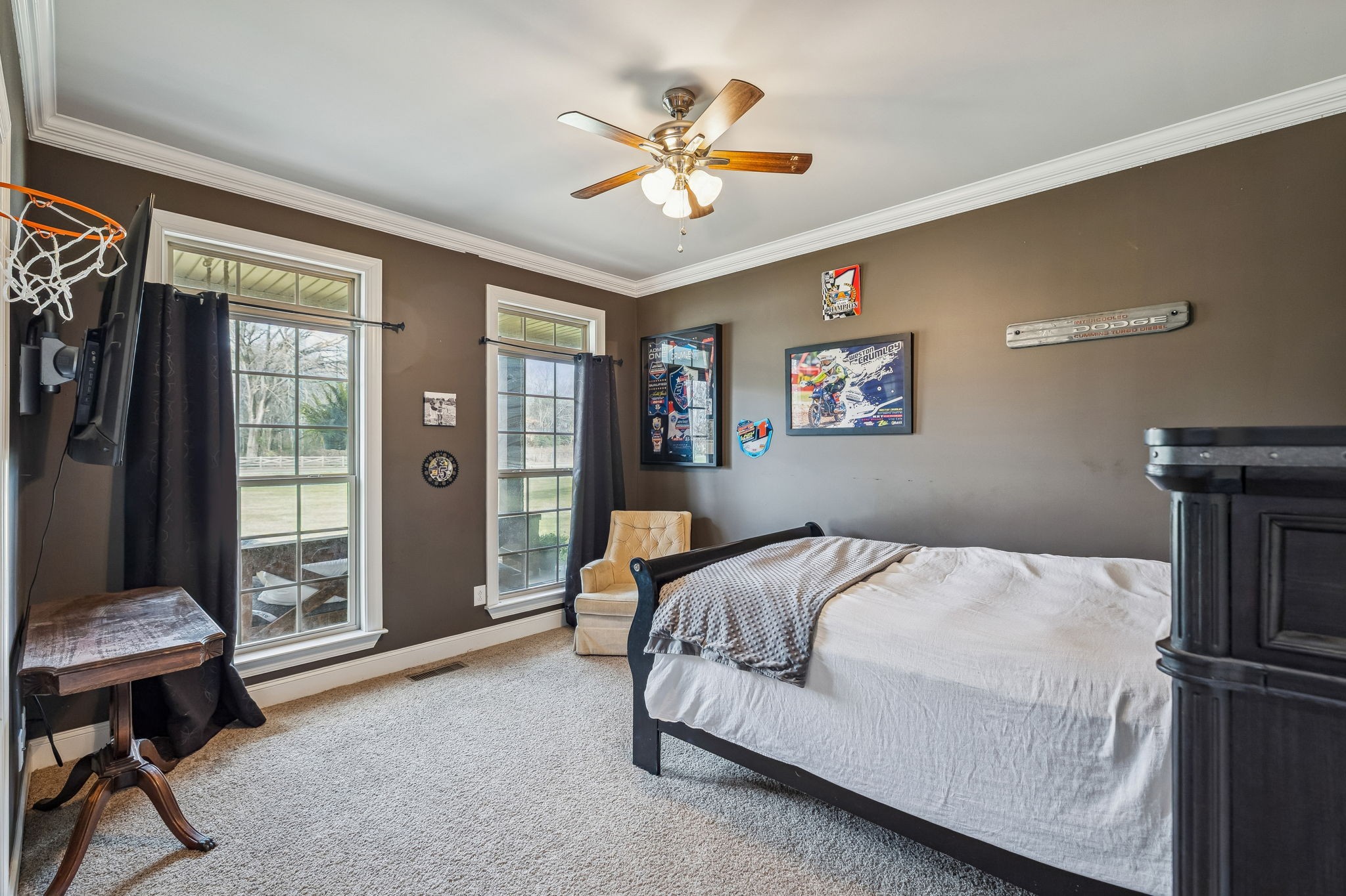 2845 Anes Station Road Lewisburg, TN 37091 - Photo 37 of 70 a bedroom with a bed and a chandelier