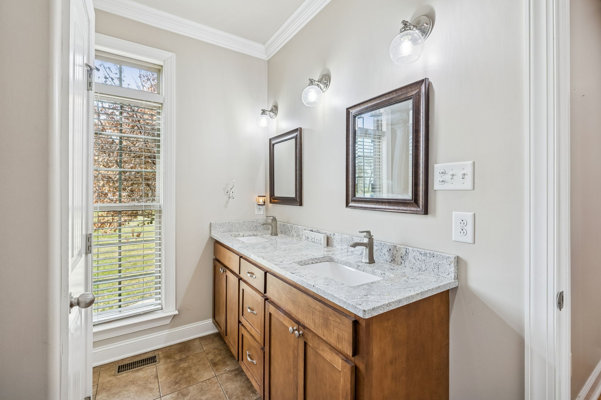 2845 Anes Station Road Lewisburg, TN 37091 - Photo 39 of 70 a bathroom with a sink and a mirror