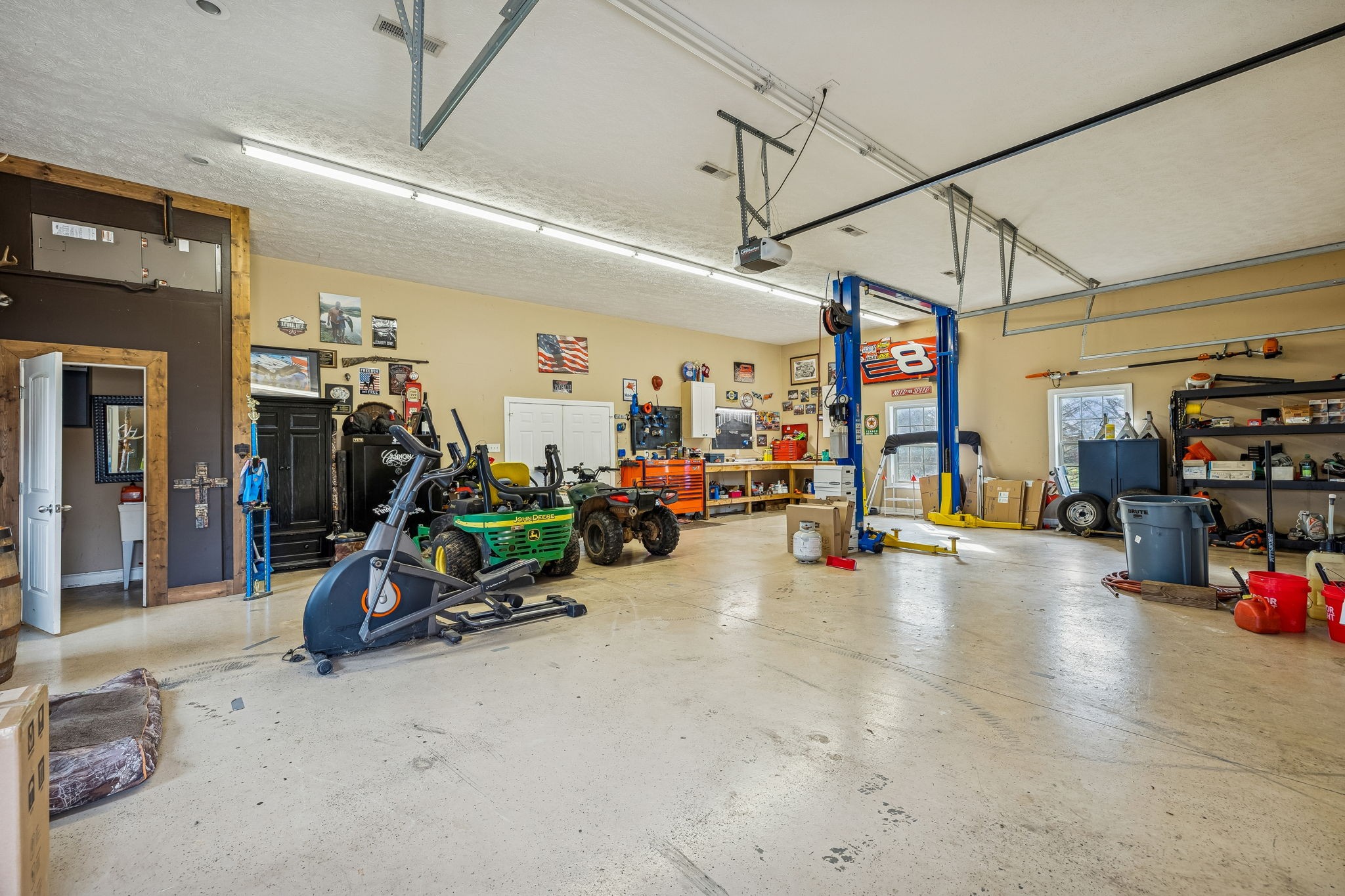 2845 Anes Station Road Lewisburg, TN 37091 - Photo 47 of 70 a view of a garage with gym equipment