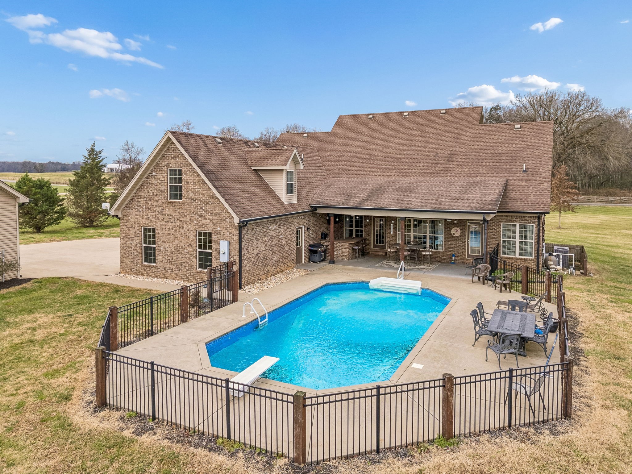 2845 Anes Station Road Lewisburg, TN 37091 - Photo 66 of 70 a view of a house with swimming pool and sitting area