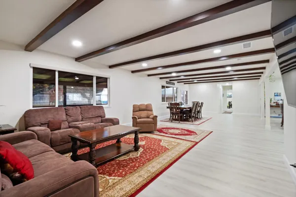 a dining room with furniture and a table